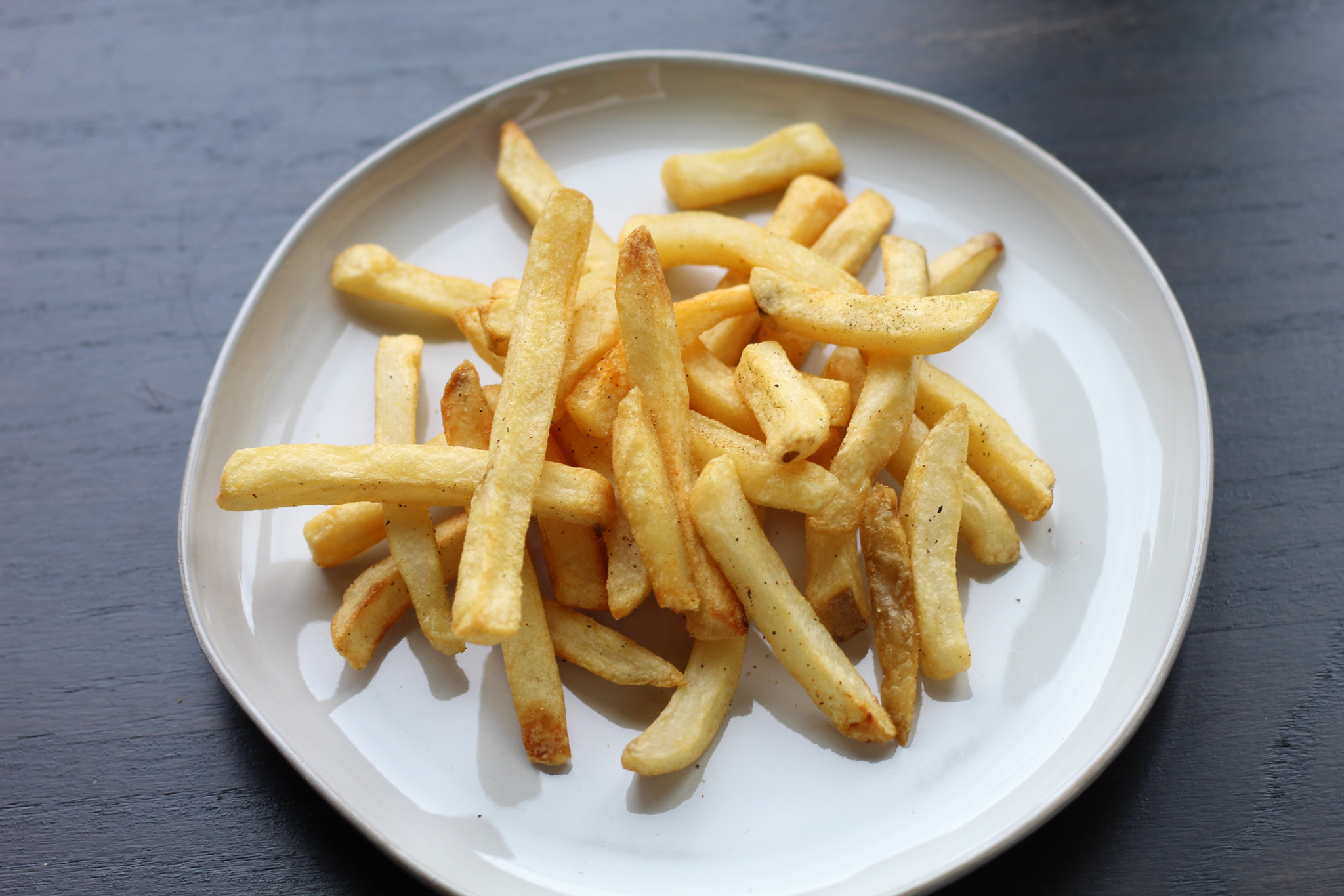 air fryer frozen french fries on a plate