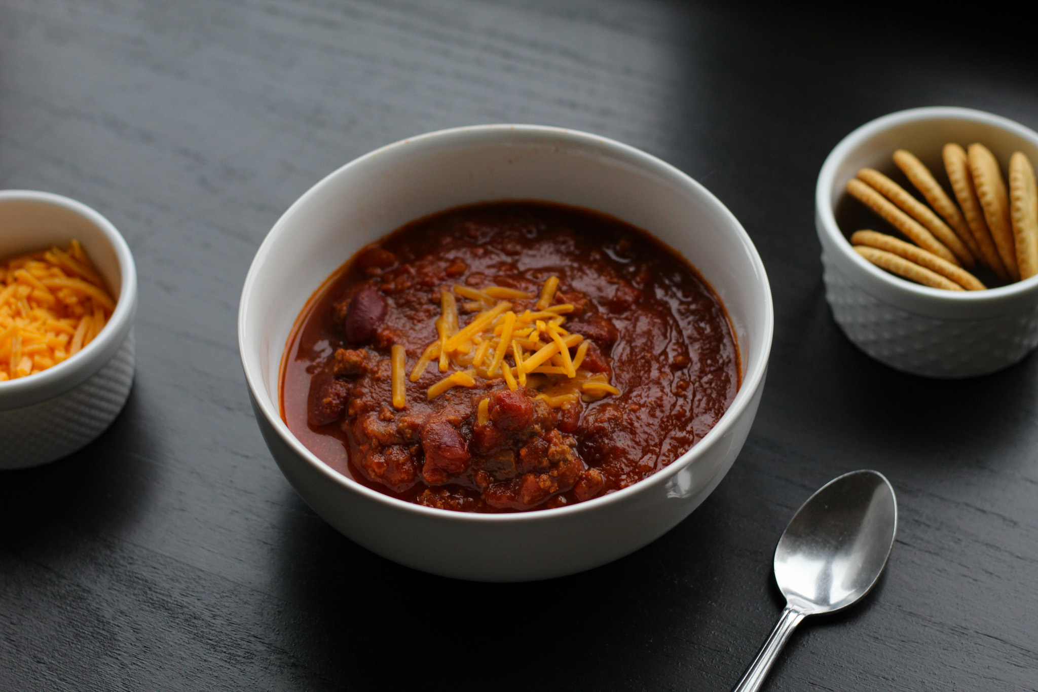 low sodium chili in bowl topped with shredded cheese