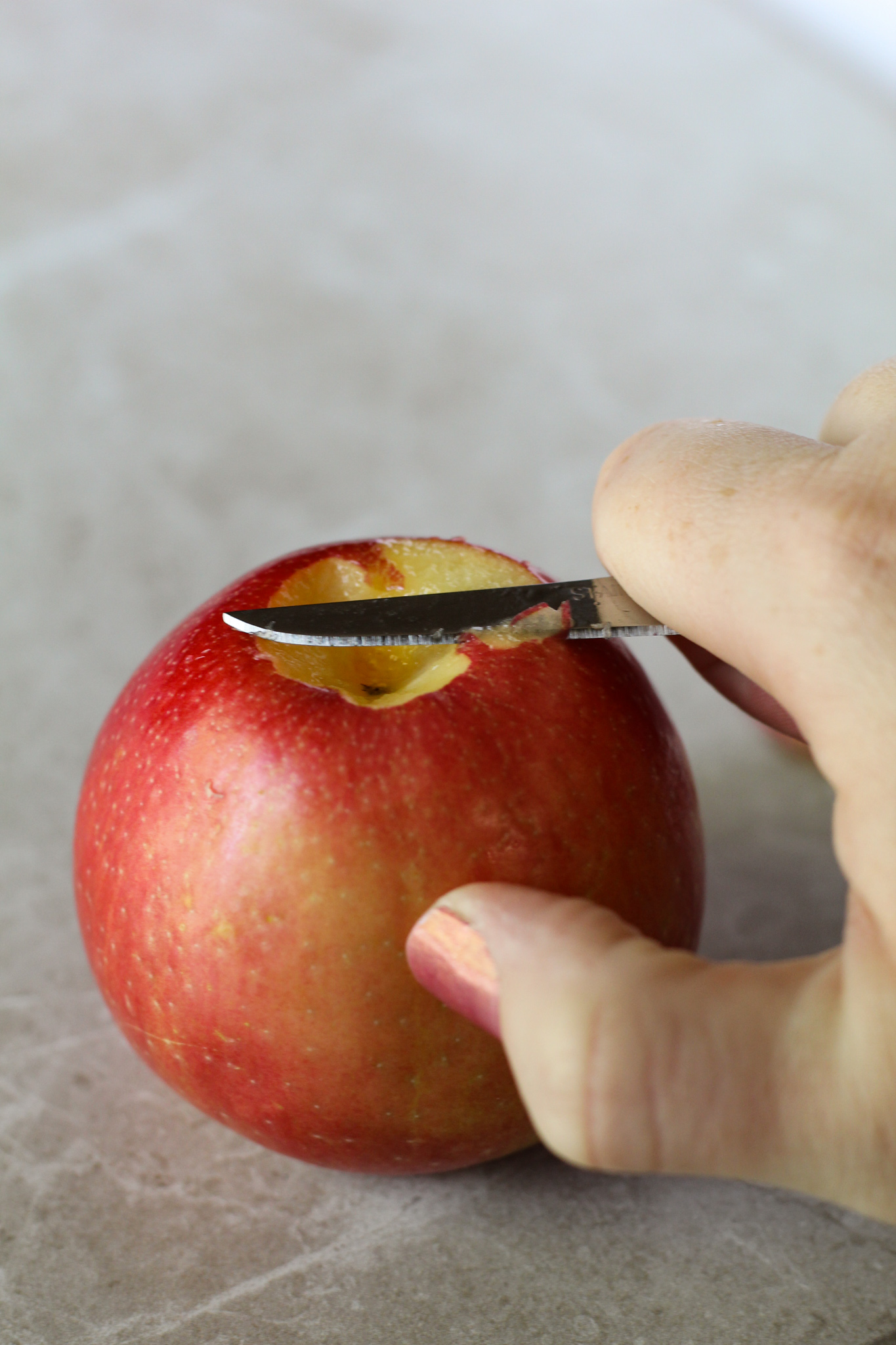 Cutting bottom off an apple